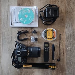 Nikon D7100 DSLR camera/ 18-140 mm lens
